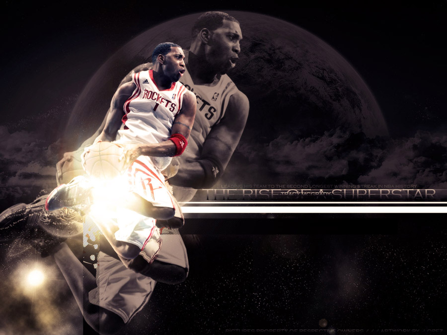 Download Tracy McGrady standing tall in the basketball court. Wallpaper
